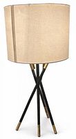 Full view of lamp showing tripod base, brass caps, and linen drum shade