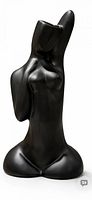 Front view of matte black abstract female torso sculpture