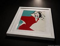 Oblique view of framed fashion portrait artwork showing colors, mat, frame and signature