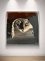 frontal view of framed cat trompe-l’œil print