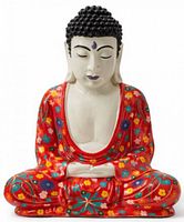 Front view of ceramic Buddha showing floral robe and facial features