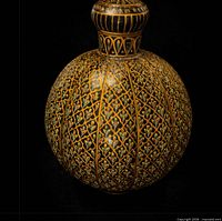 overall view of ornate hand-painted ceramic vase