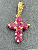 Front view showing rubies and cross design