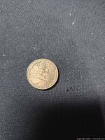 Reverse view showing Canadian coat of arms and 1939 legend