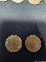 Reverse sides showing wreath design and dates