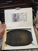 Platter in original packaging with information card visible