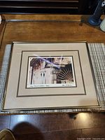 Front view showing print, matting and frame