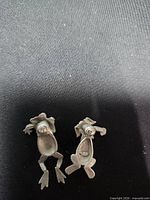 Back view showing J.J. signature and posts