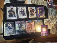 All ten hockey cards in two rows on protective case