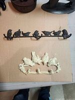 Both cast iron bird hook racks overview