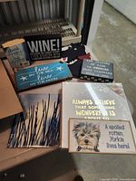 Overview of assorted signs and canvas prints