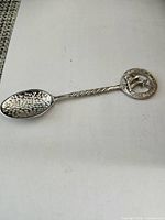 full view of spoon bowl side showing textured interior