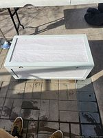 Closed chest top view showing white finish and pattern