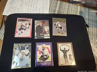 All six Wayne Gretzky cards laid out on black background