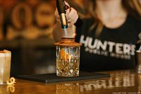 Smoked cocktail being prepared at Hunter's Public House bar