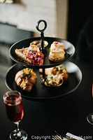 Tiered serving tray with pastries used for promotional imagery of The Vanitea Room experience