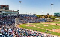 Panoramic view of baseball stadium during game, represents seating experience