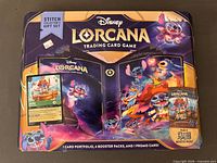 Front of sealed Disney Lorcana Stitch Collector's Gift Set box showing contents list