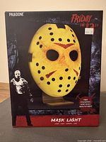 Front of retail box showing Jason Mask Light, branding, price tag