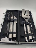 Top view of open case showing all utensils and case interior