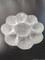 Full view of satin glass oyster plate showing six wells and central area