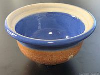 top view showing blue glazed interior and rim