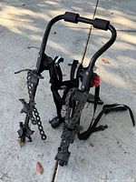 Front view showing frame, arms, pads, straps