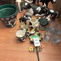 Group shot showing planter, figurines, tumblers, mug, creamer, jar, planter cup, tile, and garden stake
