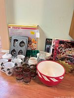 Group shot of all kitchenware, drinkware, bakeware and cookbooks