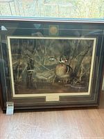 Full view of framed print with mat and glass