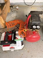Compressor, hose, nailer box and tool overview