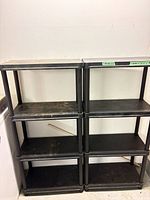 Front view of both shelving units side by side