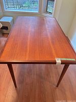 Full top and legs of teak dining table