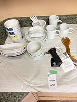 overview of all ceramic pieces, utensils, torch