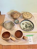 Group shot of all nine pieces in lot