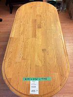 Top view of solid pine coffee table showing overall shape and surface marks