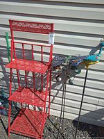 Full view of plant stand and garden stake