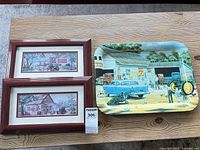 Overall lot with two framed prints and metal tray on table
