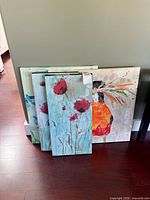 All three canvas prints leaning against wall