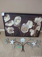 Framed print and metal sculpture overview