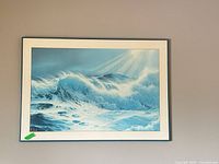 Full view of framed seascape print on wall