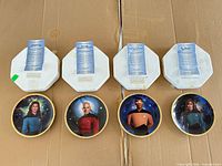 Four character plates with COAs and Styrofoam boxes