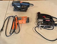 Overview of all three corded power tools with cords visible