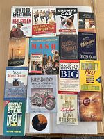 All 15+ books laid out in 4×4 grid