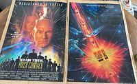 Both posters side by side showing overall design and size