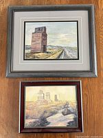 Both framed prints shown together for scale and comparison