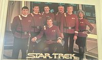 Front view of mounted Star Trek cast poster