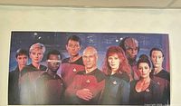 Full view of mounted Star Trek: TNG cast poster