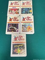 Front view of five Walt Disney Betamax tapes showing cover art and titles