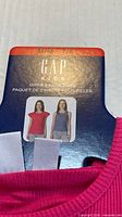 Retail hanger card showing Gap Kids 2-pack tops size M 7/8